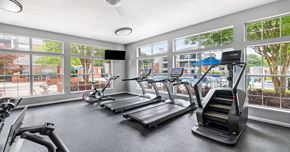 Durham apartment for rent - A gym with treadmills, elliptical machines, and a stair climber.