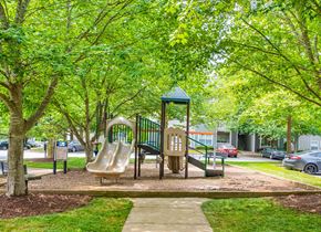 Cary apartment for rent - a playground with a slide in a park