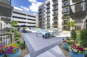 Raleigh apartment for rent - A courtyard with a pool and apartment buildings.