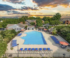 Nashville apartment for rent - an aerial view of a swimming pool at sunset