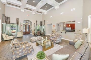 Gallatin apartment for rent - a living room with couches and chairs and a table