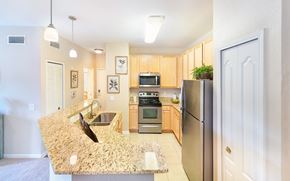 Gallatin apartment for rent - a kitchen with stainless steel appliances and granite counter tops