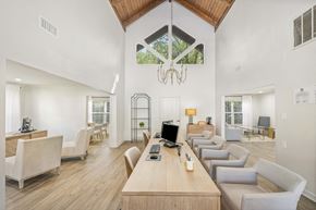 Chattanooga apartment for rent - A modern conference room with a long table and chairs.