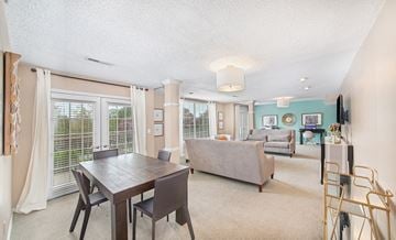 Hixson apartment for rent - a living room with a dining room table and a couch