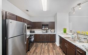Cordova apartment for rent - our spacious kitchen is equipped with stainless steel appliances and granite counter tops