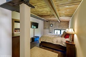 Winnetka apartment for rent - a bedroom with a bed and a tv