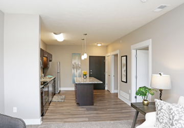 Lincoln apartment for rent - a living room with a kitchen and a table