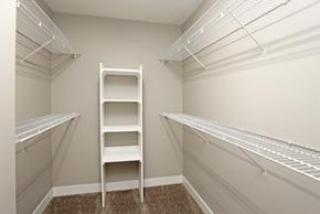 Lincoln apartment for rent - a spacious closet with two racks and a ladder in a closet