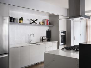 East Boston apartment for rent - a kitchen with white cabinets and a counter top