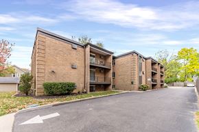 Cincinnati apartment for rent - A white arrow on a street points to the right.