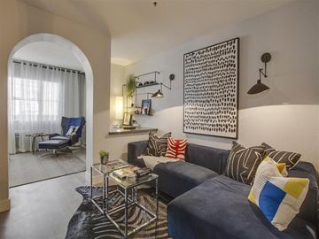 Los Angeles apartment for rent - a living room with a couch and a table