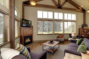 Lafayette apartment for rent - Clubhouse with seating and fireplace Apt Rentals at Copper Stone Apartments in Lafayette, CO 