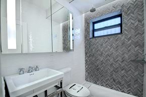 New York apartment for rent - a white bathroom with a sink and a toilet