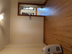 Chicago apartment for rent - an empty living room with wood floors and a heater