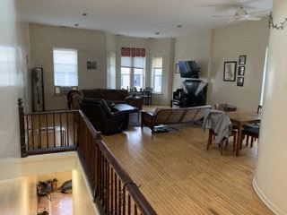 Chicago apartment for rent - a living room with a couch and a table