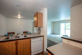 Spokane Valley apartment for rent - Farr Court Apartments Kitchen Counter and Living Room
