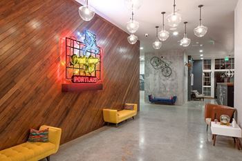 Community lounge with tv, kitchen, and shuffle board
