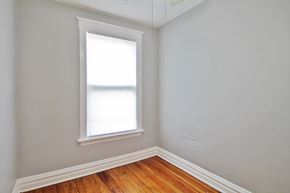 Oak Park apartment for rent - an empty room with a window and wood floors