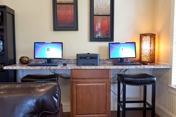 Business center with dual computer workstations