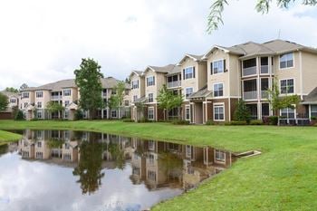 Apartment community with lakeside green space