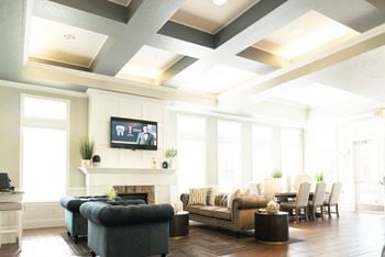 Clubhouse seating area with coffered ceiling detail