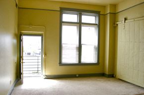 Oshkosh apartment for rent - an empty room with a window and a door