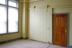 Oshkosh apartment for rent - an empty room with a door and a window