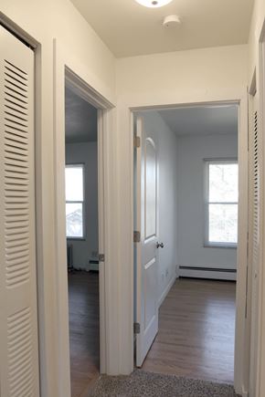 Oshkosh apartment for rent - a view of the hallway from the living room into the dining room