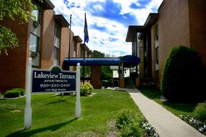 Oshkosh apartment for rent - the exterior of lakeview terrace apartments with a sign in front of the building