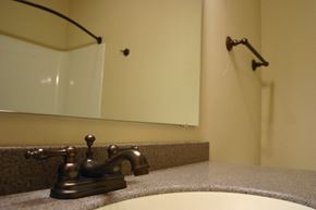 Oshkosh apartment for rent - a bathroom with a sink and a mirror