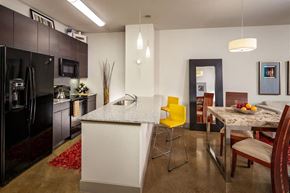 Dallas apartment for rent - Open Concept Kitchen with Island/ Breakfast Bar at Apartments for Rent Oak Lawn Dallas