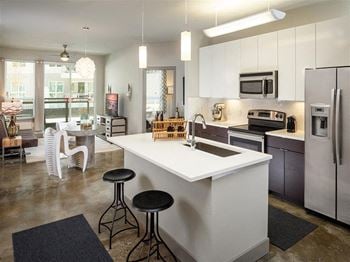 Echo apartments model kitchen with quartz countertops