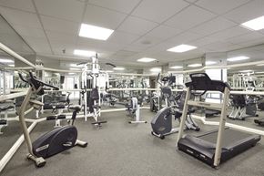 Mississauga apartment for rent - a gym with weights and other exercise equipment