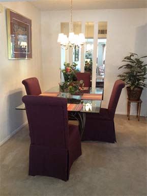 Charleston apartment for rent - a dining room with a table and chairs
