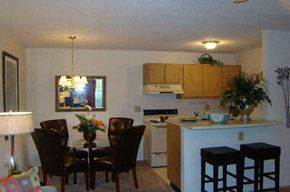 Charleston apartment for rent - a kitchen and dining room with a table and chairs