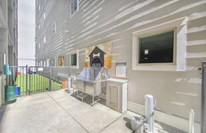 Nashville apartment for rent - a fenced in area with a sink in the corner of a building