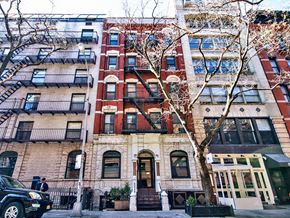 New York apartment for rent - a view of a building with a tree in front of it
