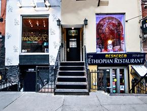New York apartment for rent - the front of a restaurant on a city street