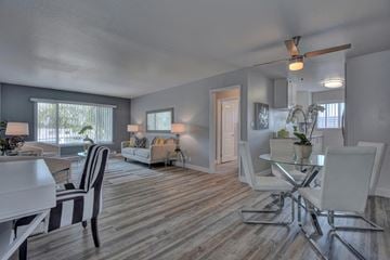 Redwood City apartment for rent - a living room and dining room with a table and chairs