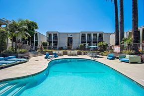 Downey apartment for rent - Swimming Pool And Relaxing Area at Parc at 5 Apartments, Downey, CA