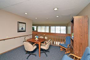 Rogers apartment for rent - a conference room with chairs and a table