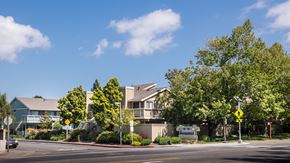 Novato apartment for rent - a row of apartment buildings on the corner of a street