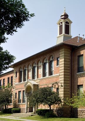 Rochester apartment for rent - a brick building with a steeple on top of it