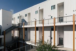 Mesa apartment for rent - the exterior of a building with stairs and a balcony