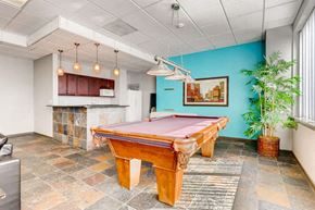 Aurora apartment for rent - a game room with a pink pool table