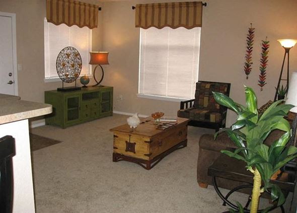 Aurora apartment for rent - a living room with a couch and a table