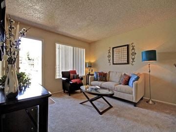 Glendale apartment for rent - a living room with a couch and a table