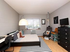 Sioux Falls apartment for rent - a bedroom with a bed and a tv in it