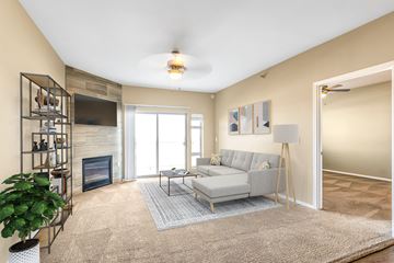 Sioux Falls apartment for rent - a living room with a couch and a fireplace