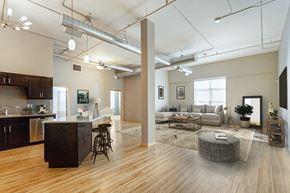 Sioux Falls apartment for rent - an open living room with a kitchen and a living room